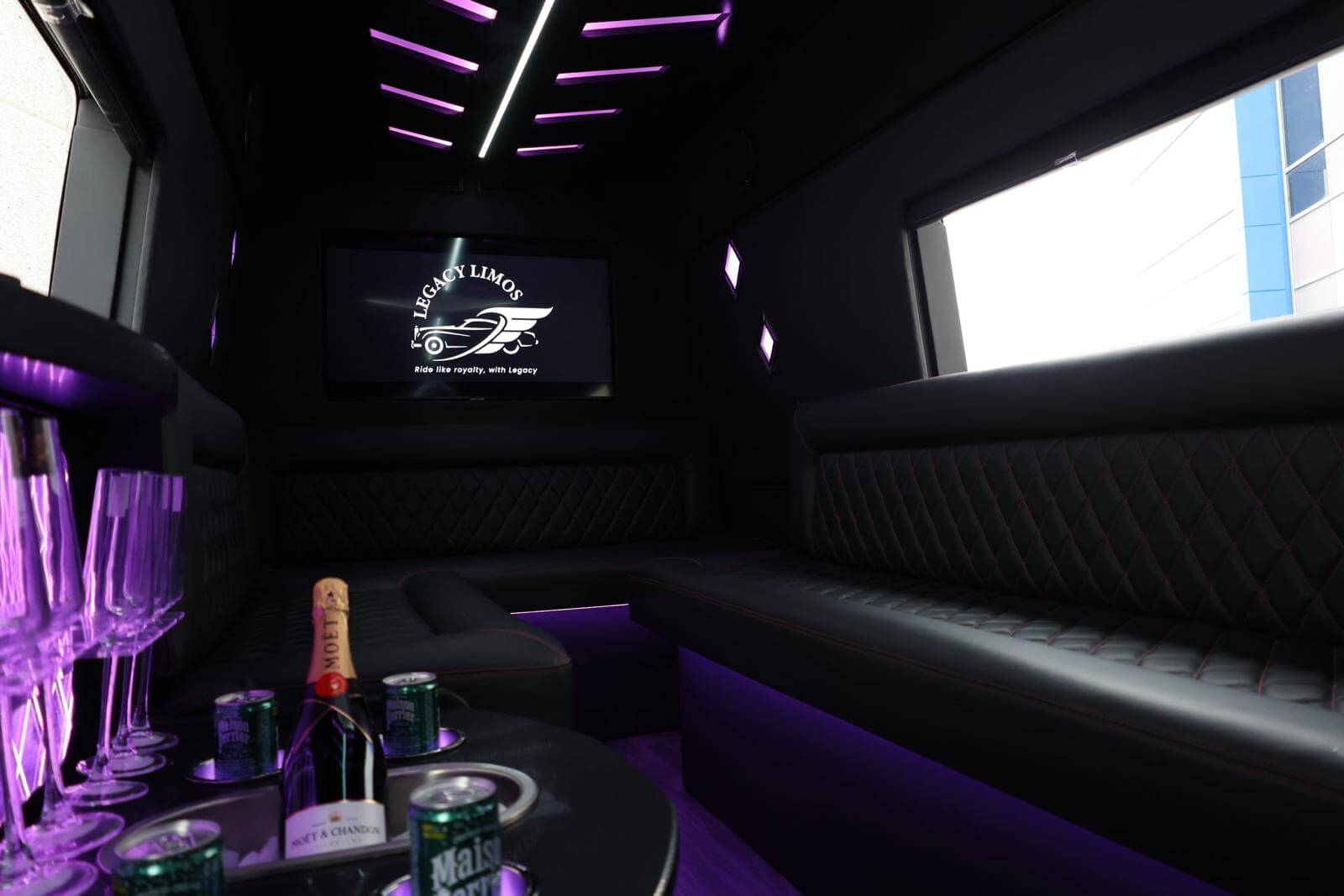 Legacy Limos Sprinter interior — quilted leather, LED lounge lighting and champagne bar (3)